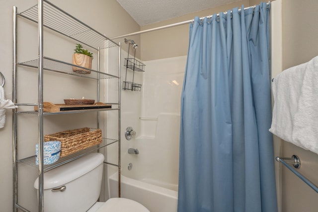 285 Payne St Unit 23B, Miramar Beach, FL 32550 - full bathroom with shower / bathtub combination with curtain, toilet, and a textured ceiling