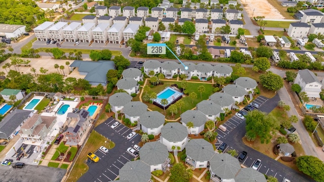 285 Payne St Unit 23B, Miramar Beach, FL 32550 - aerial perspective of suburban area featuring a pool