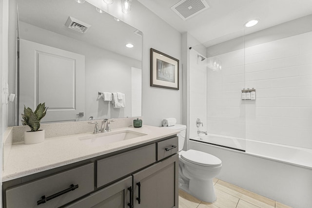 15928 Front Beach Rd # 32003, Panama City Beach, FL 32413 - bathroom featuring vanity, toilet, shower / bath combination, and recessed lighting