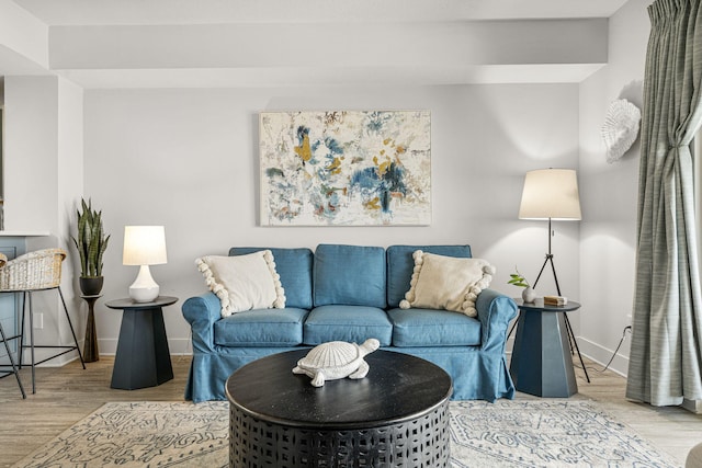 15928 Front Beach Rd # 32003, Panama City Beach, FL 32413 - living area featuring wood finished floors and baseboards