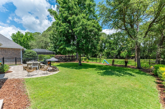 4467 Turnberry Pl, Niceville, FL 32578 - view of yard with a patio area