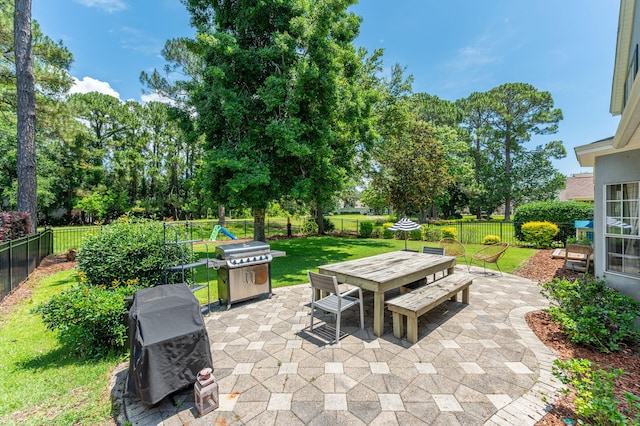 4467 Turnberry Pl, Niceville, FL 32578 - view of patio / terrace featuring outdoor dining area, grilling area, and view of scattered trees