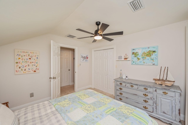 4467 Turnberry Pl, Niceville, FL 32578 - bedroom featuring a closet, baseboards, light colored carpet, vaulted ceiling, and a ceiling fan