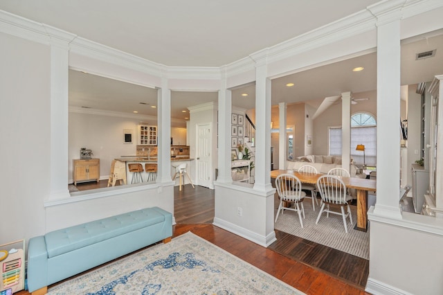 4467 Turnberry Pl, Niceville, FL 32578 - living area with wood finished floors, ornamental molding, recessed lighting, decorative columns, and baseboards
