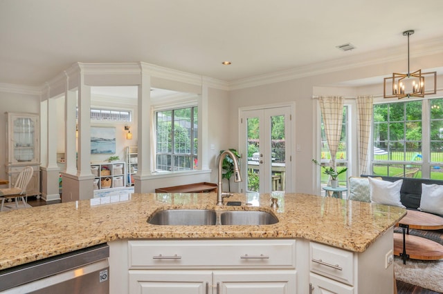 4467 Turnberry Pl, Niceville, FL 32578 - kitchen with a sink, stainless steel dishwasher, light stone counters, a chandelier, and crown molding