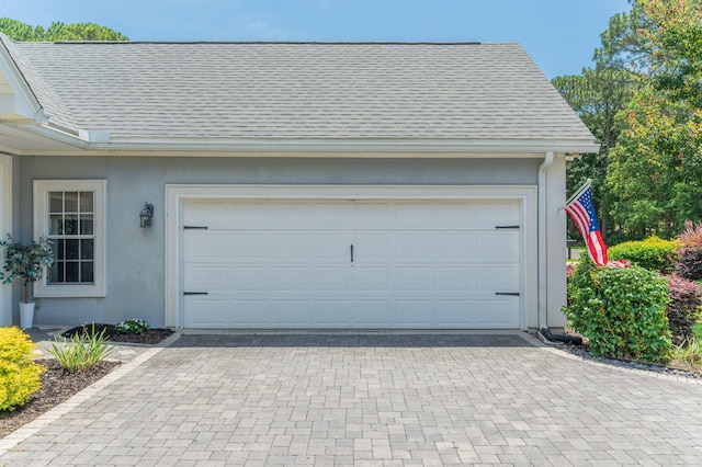4467 Turnberry Pl, Niceville, FL 32578 - garage featuring decorative driveway