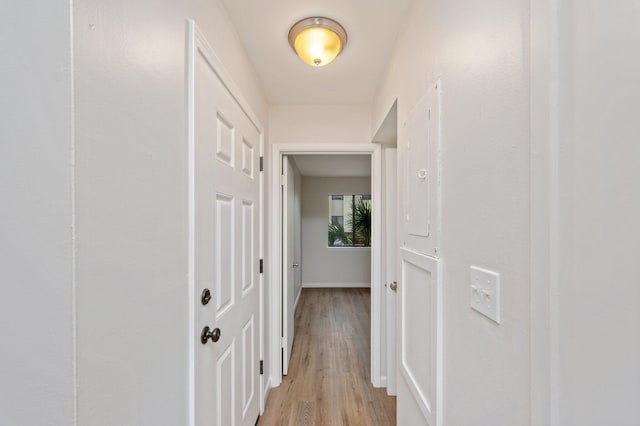 308 Miracle Strip Pkwy Unit 16B, Fort Walton Beach, FL 32548 - hallway with light wood-type flooring and baseboards