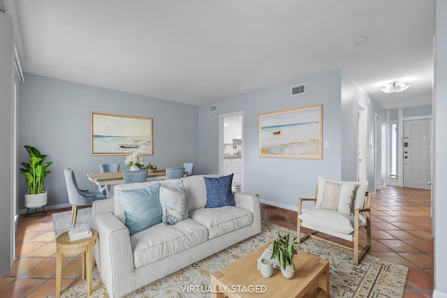 4 SW Miracle Strip Pkwy Unit 23, Fort Walton Beach, FL 32548 - tiled living room featuring baseboards