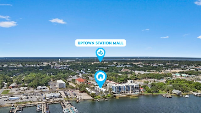 4 SW Miracle Strip Pkwy Unit 23, Fort Walton Beach, FL 32548 - bird's eye view of a large body of water and a tree filled landscape