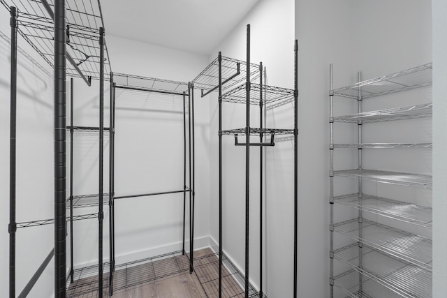4 SW Miracle Strip Pkwy Unit 23, Fort Walton Beach, FL 32548 - walk in closet with wood finished floors