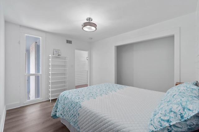 4 SW Miracle Strip Pkwy Unit 23, Fort Walton Beach, FL 32548 - bedroom featuring wood finished floors