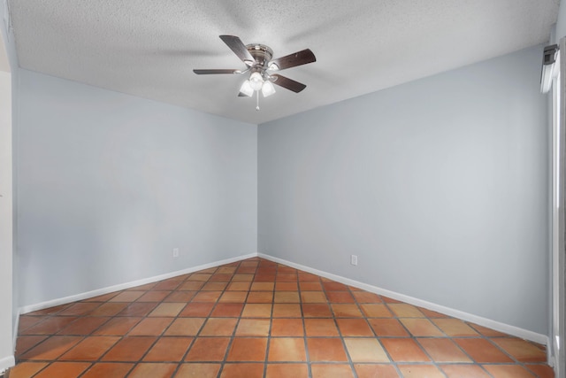 4 SW Miracle Strip Pkwy Unit 23, Fort Walton Beach, FL 32548 - tiled empty room with a ceiling fan, a textured ceiling, and baseboards