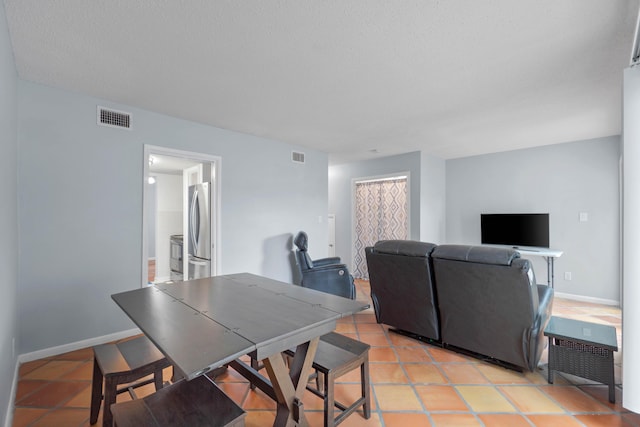 4 SW Miracle Strip Pkwy Unit 23, Fort Walton Beach, FL 32548 - dining space featuring light tile patterned floors and baseboards