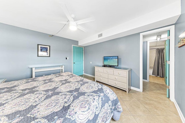 667 Nautilus Ct Unit 302, Fort Walton Beach, FL 32548 - bedroom with light tile patterned floors, baseboards, and ceiling fan