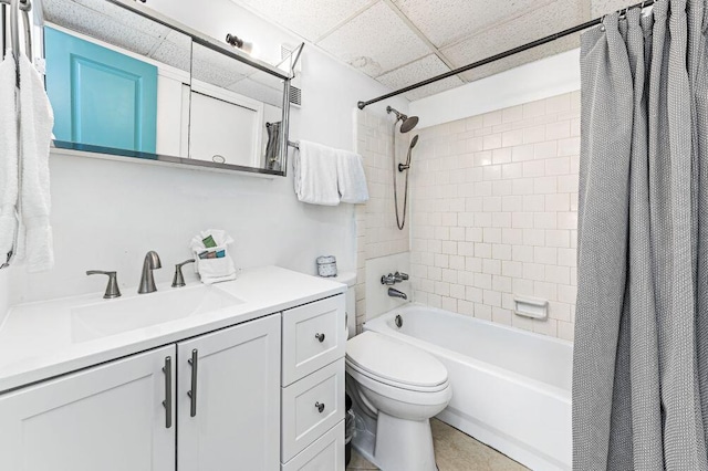 667 Nautilus Ct Unit 302, Fort Walton Beach, FL 32548 - bathroom featuring shower / tub combo with curtain, vanity, toilet, and a drop ceiling