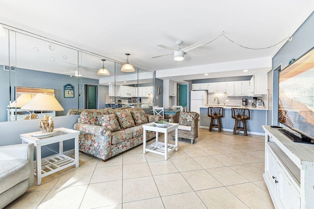 667 Nautilus Ct Unit 302, Fort Walton Beach, FL 32548 - living room with ceiling fan and light tile patterned floors