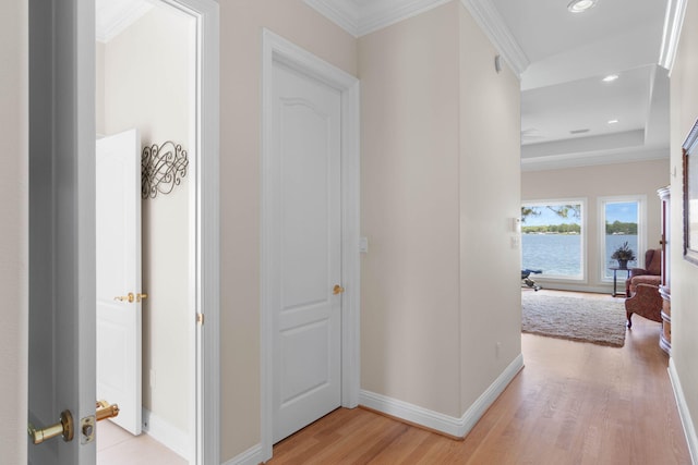 23 Paradise Point Rd, Shalimar, FL 32579 - corridor featuring light wood finished floors, baseboards, crown molding, recessed lighting, and a water view