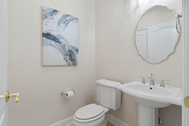 23 Paradise Point Rd, Shalimar, FL 32579 - half bath with baseboards and toilet