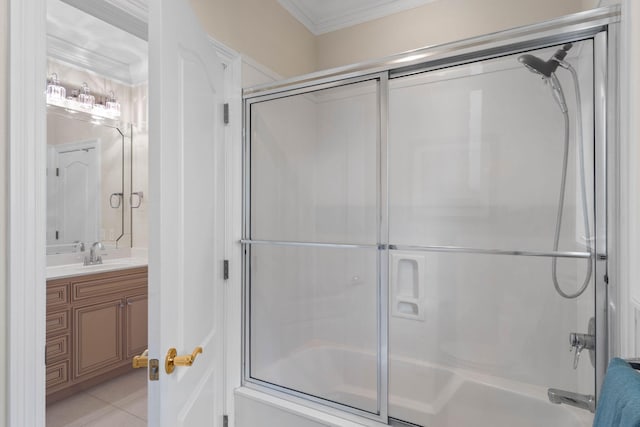 23 Paradise Point Rd, Shalimar, FL 32579 - full bath featuring bath / shower combo with glass door, vanity, crown molding, and tile patterned floors