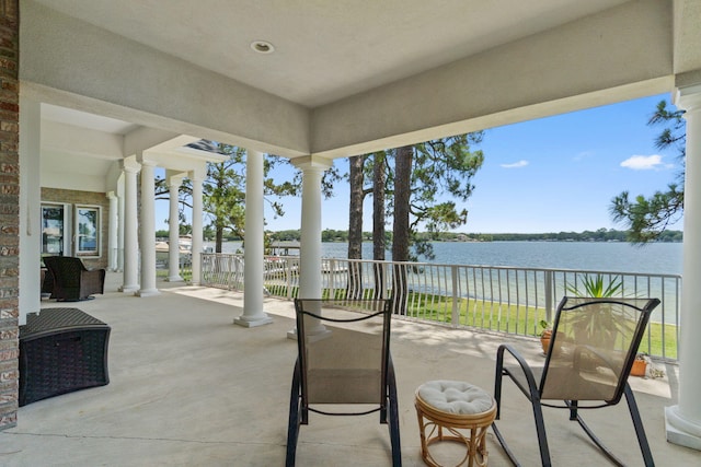 23 Paradise Point Rd, Shalimar, FL 32579 - view of patio featuring a water view