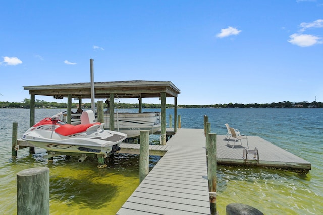 23 Paradise Point Rd, Shalimar, FL 32579 - dock featuring boat lift and a water view