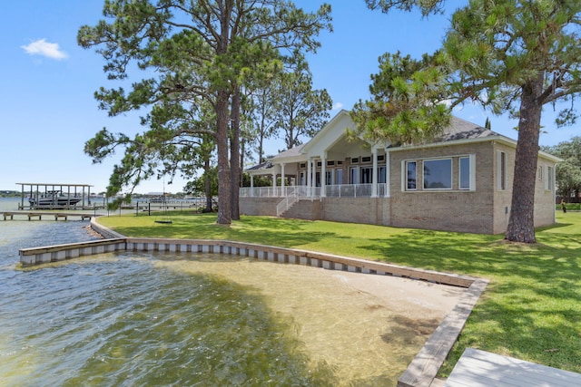 23 Paradise Point Rd, Shalimar, FL 32579 - dock area with a yard, a water view, stairway, and boat lift