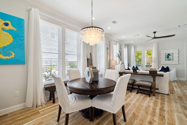300 Cassine Garden Cir, Santa Rosa Beach, FL 32459 - dining room with a chandelier, ornamental molding, ceiling fan, light wood-type flooring, and recessed lighting