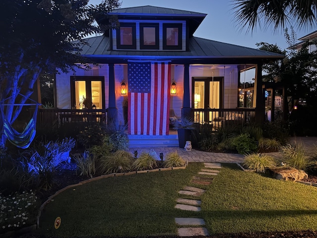 300 Cassine Garden Cir, Santa Rosa Beach, FL 32459 - view of front of home featuring a standing seam roof, covered porch, and a metal roof