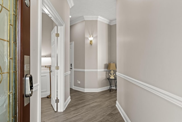 72 Tranquility Ln, Destin, FL 32541 - hall featuring wood finished floors, baseboards, and crown molding