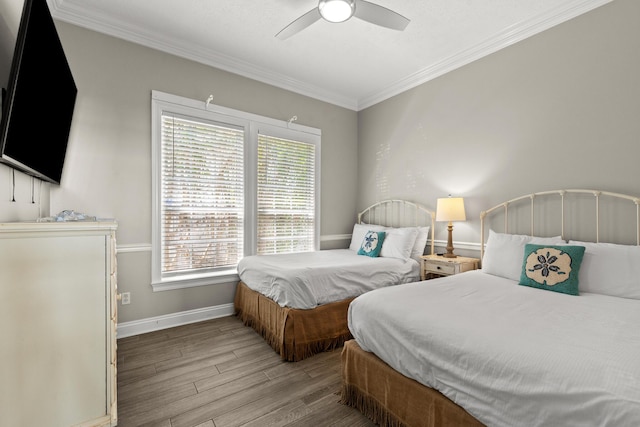 72 Tranquility Ln, Destin, FL 32541 - bedroom featuring baseboards, light wood finished floors, ornamental molding, multiple windows, and a ceiling fan