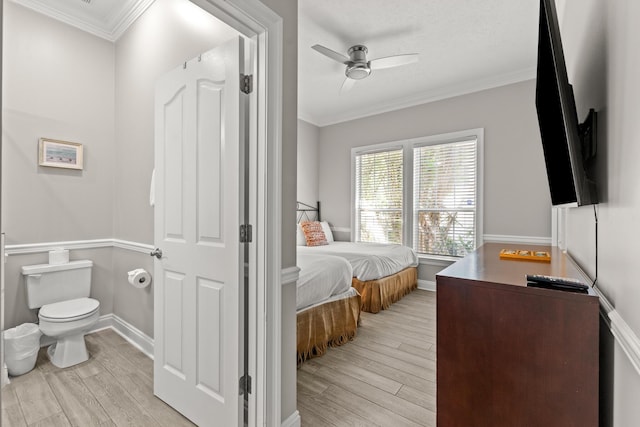 72 Tranquility Ln, Destin, FL 32541 - bedroom featuring light wood-style floors, crown molding, a ceiling fan, and baseboards