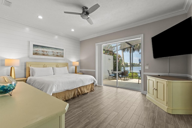 72 Tranquility Ln, Destin, FL 32541 - bedroom featuring access to exterior, wood finished floors, ornamental molding, baseboards, and recessed lighting