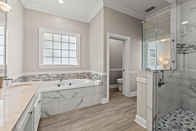 72 Tranquility Ln, Destin, FL 32541 - full bath with a bath, a marble finish shower, toilet, vanity, and crown molding