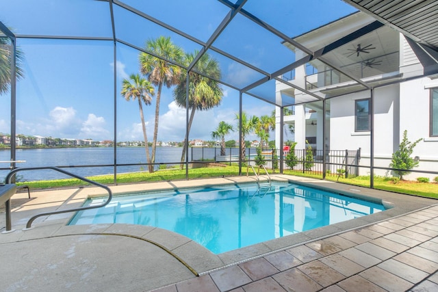 72 Tranquility Ln, Destin, FL 32541 - outdoor pool with a water view, a patio, and glass enclosure