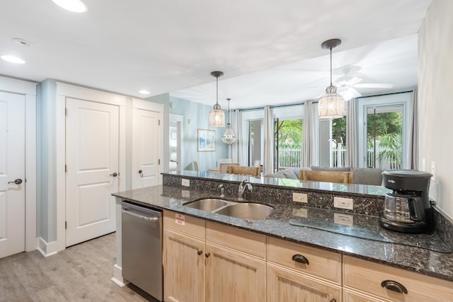 9200 Baytowne Wharf Blvd Unit 341, Miramar Beach, FL 32550 - kitchen featuring dishwasher, a sink, light brown cabinets, light wood-type flooring, and hanging light fixtures