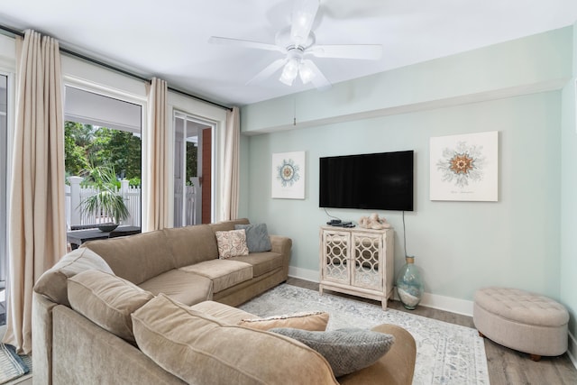9200 Baytowne Wharf Blvd Unit 341, Miramar Beach, FL 32550 - living area featuring baseboards, wood finished floors, and ceiling fan