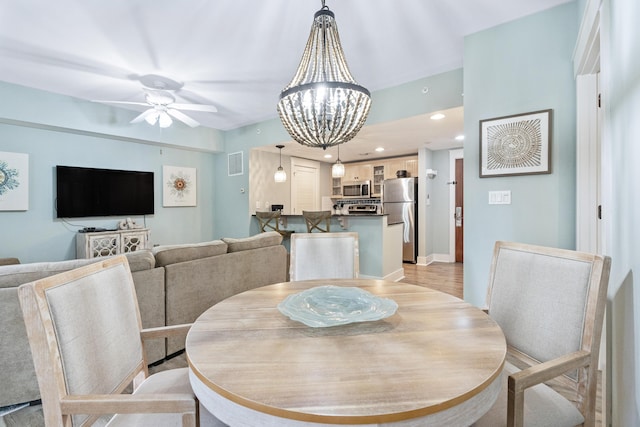 9200 Baytowne Wharf Blvd Unit 341, Miramar Beach, FL 32550 - dining room featuring a ceiling fan and recessed lighting