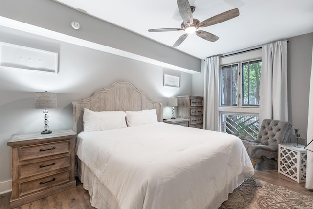 9200 Baytowne Wharf Blvd Unit 341, Miramar Beach, FL 32550 - bedroom with wood finished floors and a ceiling fan