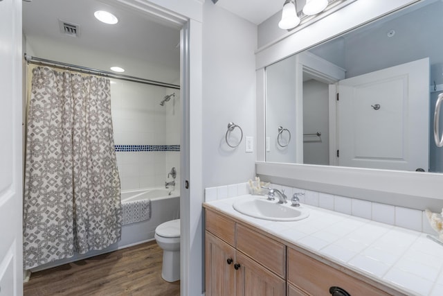 9200 Baytowne Wharf Blvd Unit 341, Miramar Beach, FL 32550 - bathroom with wood finished floors, vanity, toilet, and shower / bathtub combination with curtain