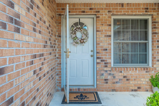 642 Alysheba Dr, Crestview, FL 32539 - view of exterior entry featuring brick siding