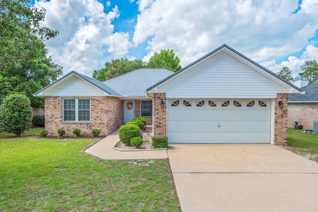 642 Alysheba Dr, Crestview, FL 32539 - single story home with brick siding, an attached garage, driveway, and a front lawn