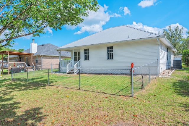 642 Alysheba Dr, Crestview, FL 32539 - rear view of house with cooling unit and metal roof