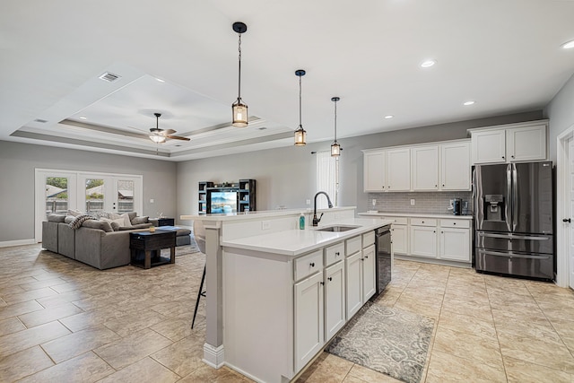 801 Playground Rd, Fort Walton Beach, FL 32547 - kitchen with stainless steel fridge with ice dispenser, a sink, dishwasher, a ceiling fan, and light countertops