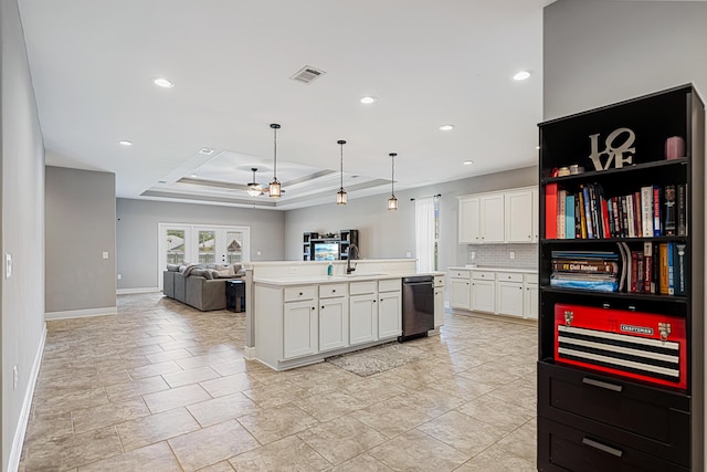 801 Playground Rd, Fort Walton Beach, FL 32547 - kitchen featuring dishwasher, backsplash, baseboards, open floor plan, and white cabinets