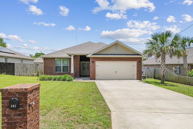 801 Playground Rd, Fort Walton Beach, FL 32547 - single story home featuring a garage, brick siding, concrete driveway, and roof with shingles