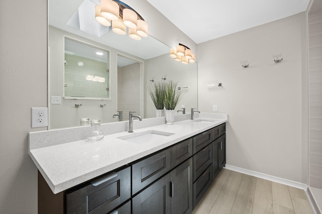 112 Meigs Dr, Shalimar, FL 32579 - full bath featuring double vanity, wood finished floors, and baseboards