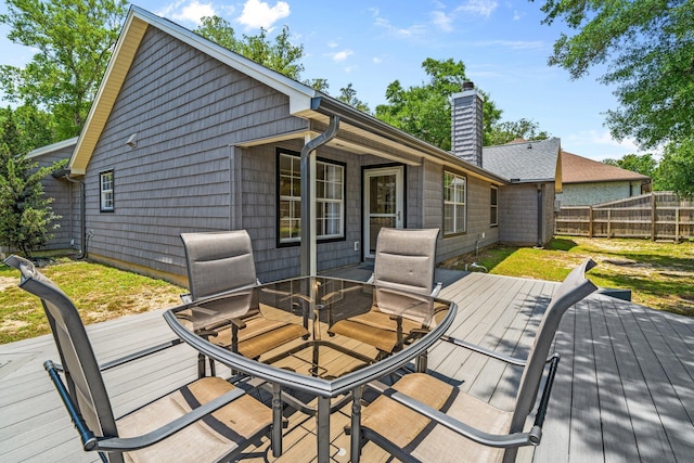 112 Meigs Dr, Shalimar, FL 32579 - deck featuring a fenced backyard and outdoor dining area