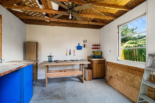 112 Meigs Dr, Shalimar, FL 32579 - miscellaneous room with a workshop area, unfinished concrete floors, and a ceiling fan