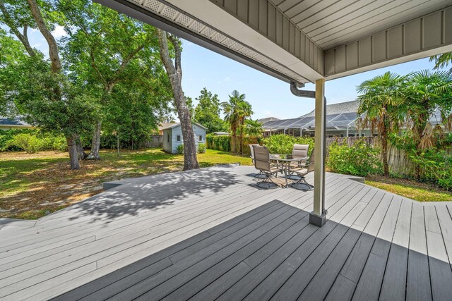 112 Meigs Dr, Shalimar, FL 32579 - deck with an outbuilding and outdoor dining area