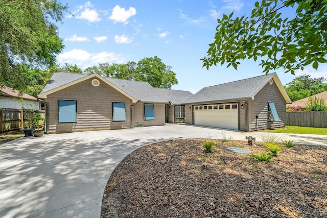 112 Meigs Dr, Shalimar, FL 32579 - view of front of property featuring concrete driveway, an attached garage, and a shingled roof